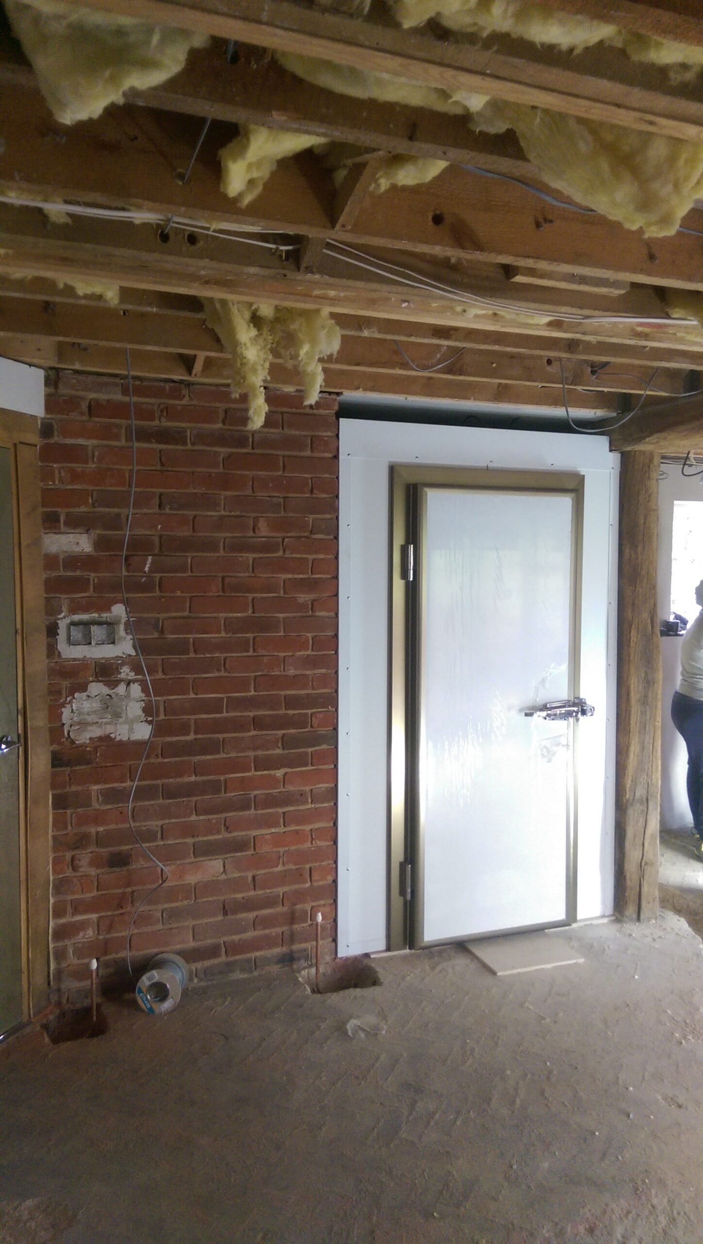 Domestic walk in fridge during installation