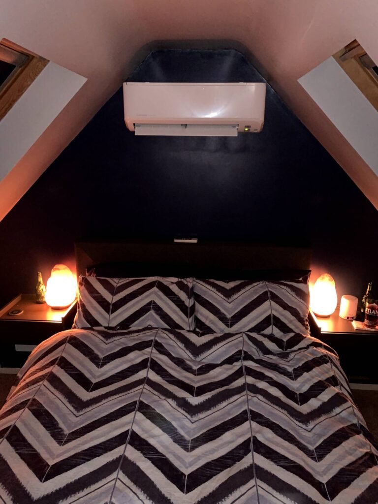 Air conditioning in brentwood above bed